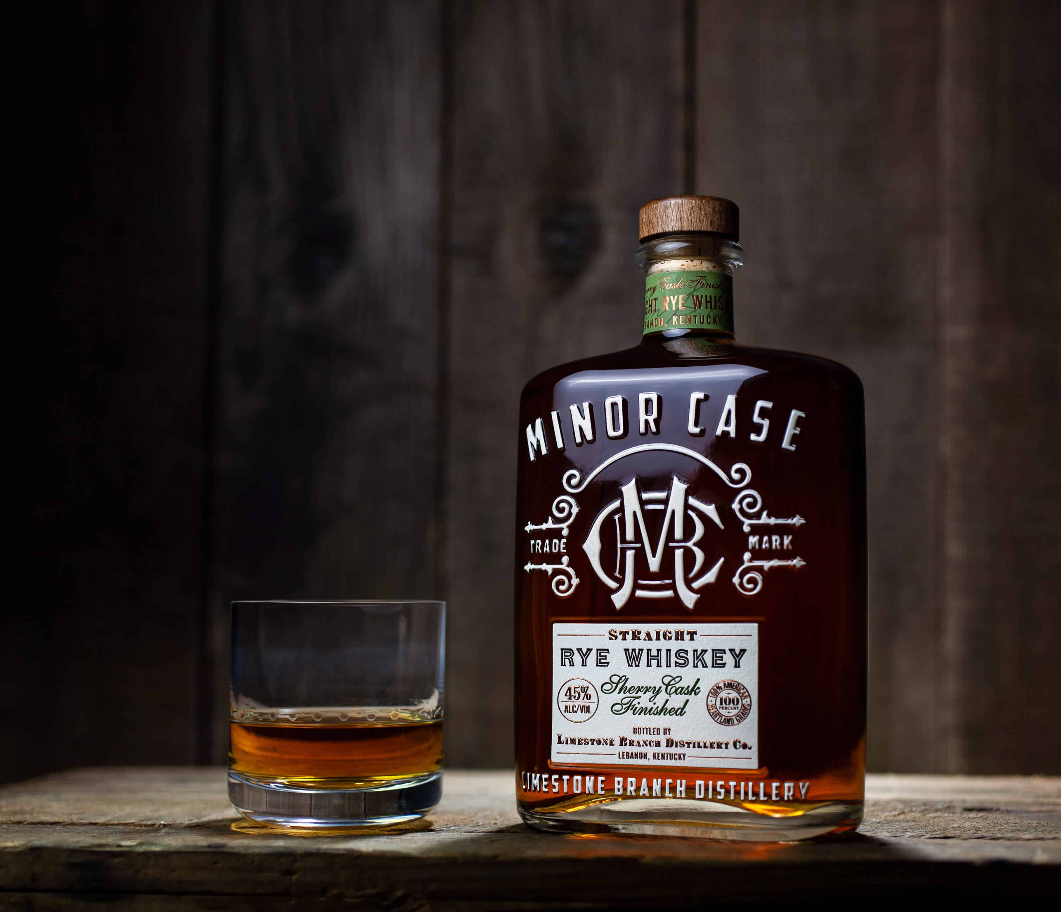 Bottle with Glass Minor Case 2019 - Minor Case Straight Rye Whiskey Refreshes Bottle Design