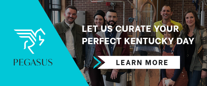 Crowd of millennials in a bourbon distillery with the Pegasus logo and Let Us Curate Your Perfect Kentucky Day