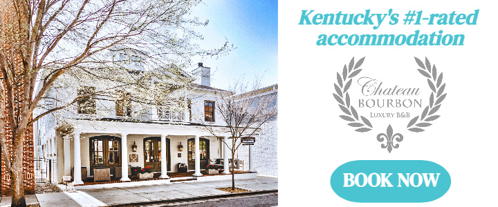 Chateau Bourbon white farmhouse building with the text Kentucky's #1-rated accommodation
